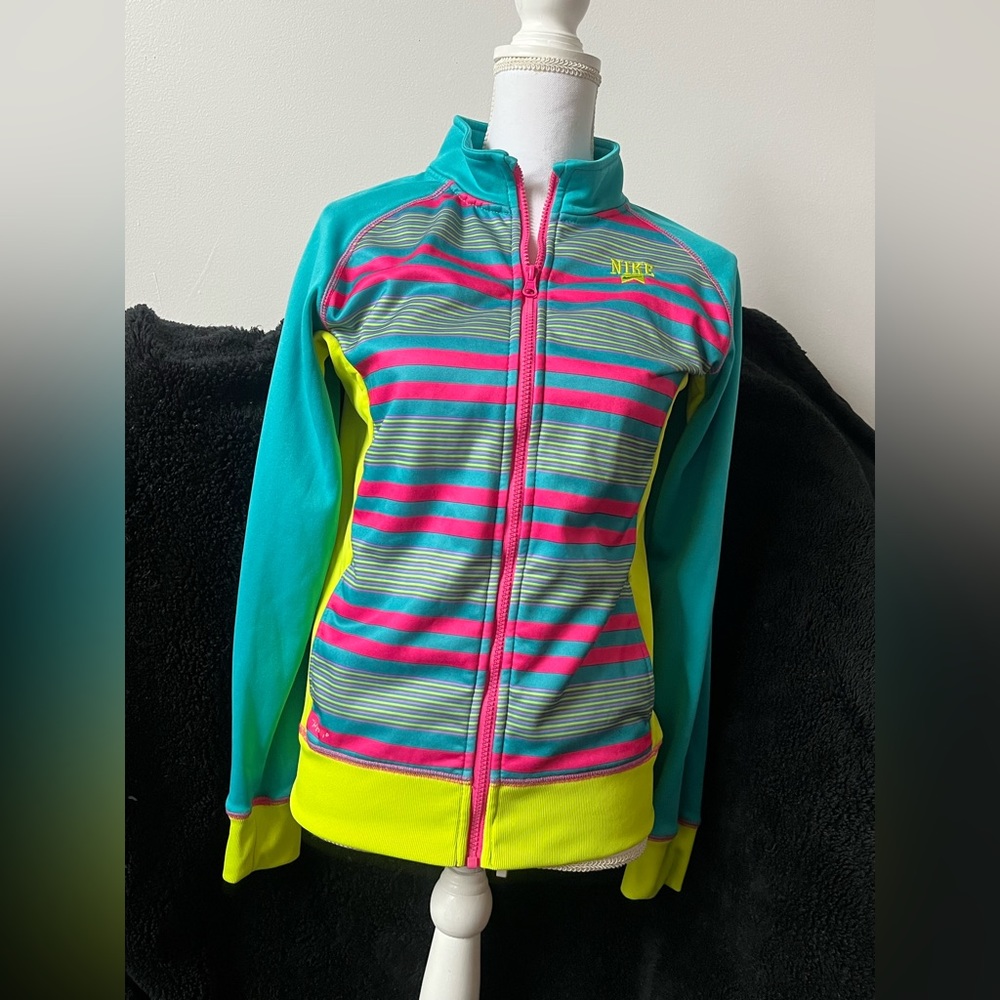 Nike kids xl pink,green, purple and turquoise.